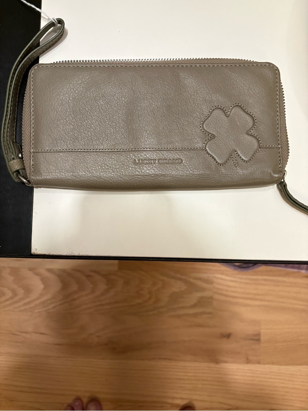 Lucky Brand Taupe Leather Zip-Around Wristlet with Clover Accent